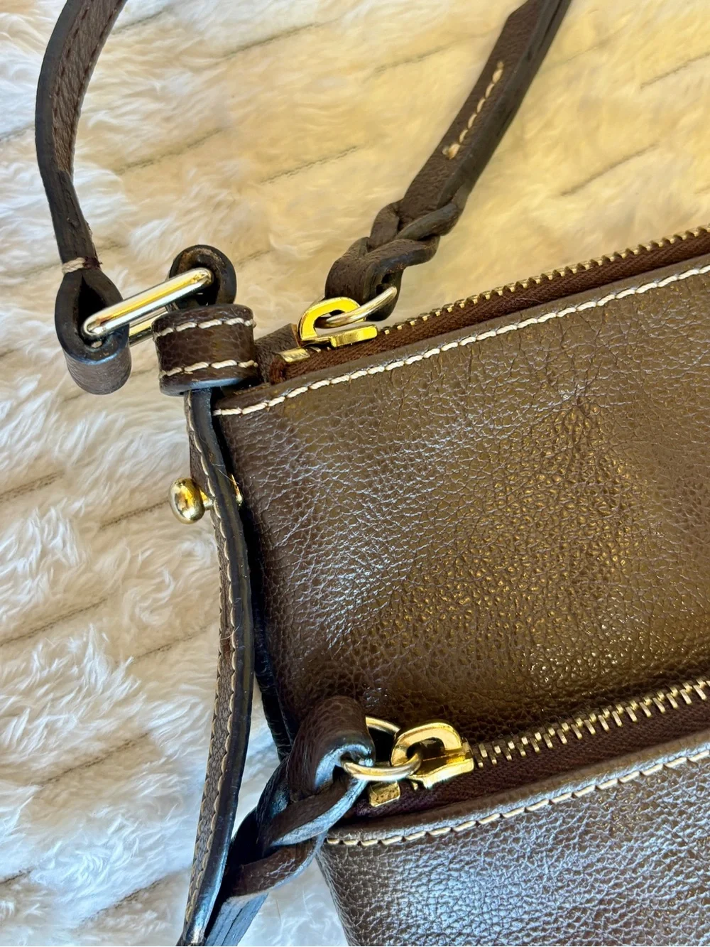 Dooney and Burke brown pebbled Crossbody with gold hardware adjustable strap